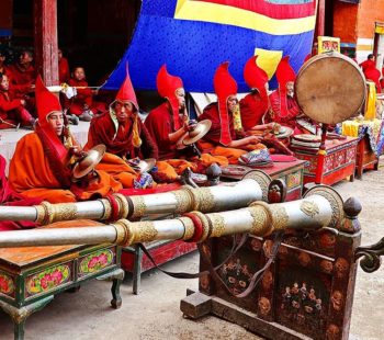 tiji festival - lamas are playing instruments