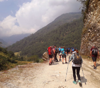 trekkers - on the way to mountain trekking in Nepal