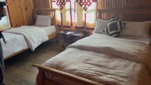 Comfortable teahouse room with wooden interior at Annapurna Base Camp