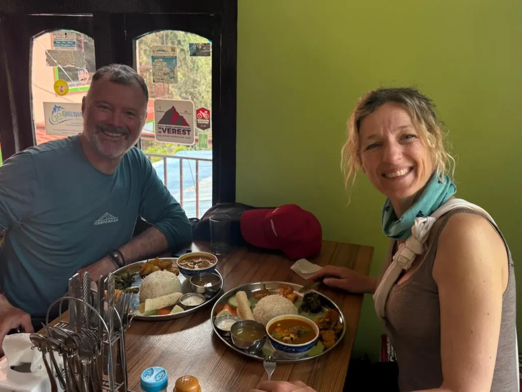 Trekkers enjoying local Nepali food during Annapurna trekking